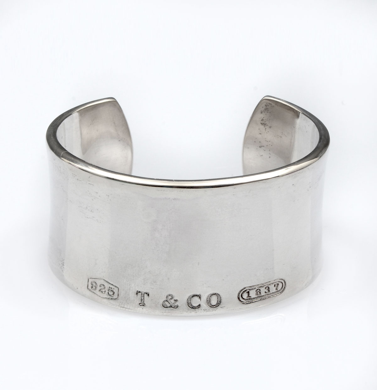 Appraisal: TIFFANY STERLING WIDE CUFF BRACELET COLLECTION Inscribed with the year