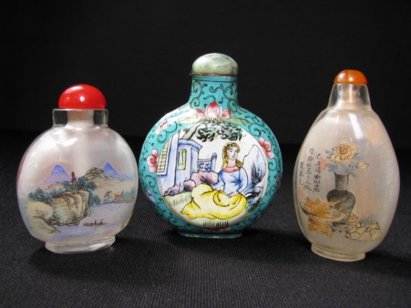 Appraisal: Three Chinese snuff bottles One European enamel tall by wide