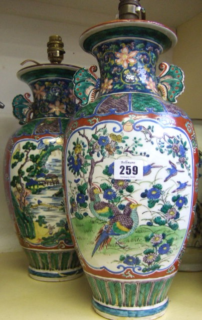 Appraisal: A pair of Imari style earthenware vases mounted as lamps