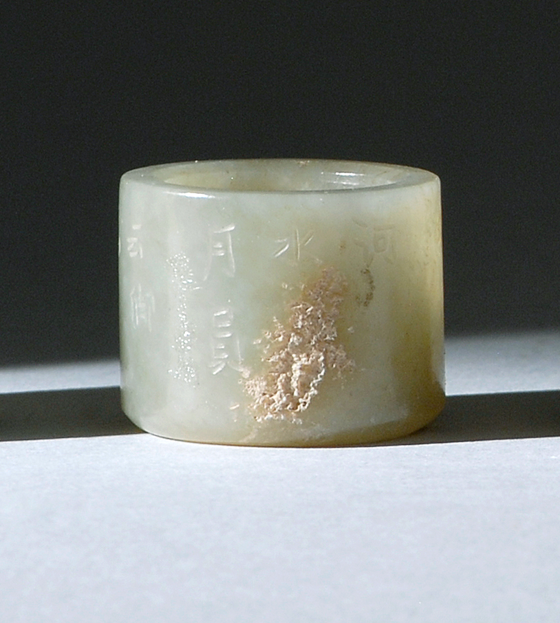 Appraisal: CELADON JADE SCHOLAR'S RING th CenturyIn cylinder form with irregular