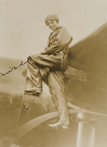 Appraisal: EARHART AMELIA Photograph Signed standing image in flight suit signed