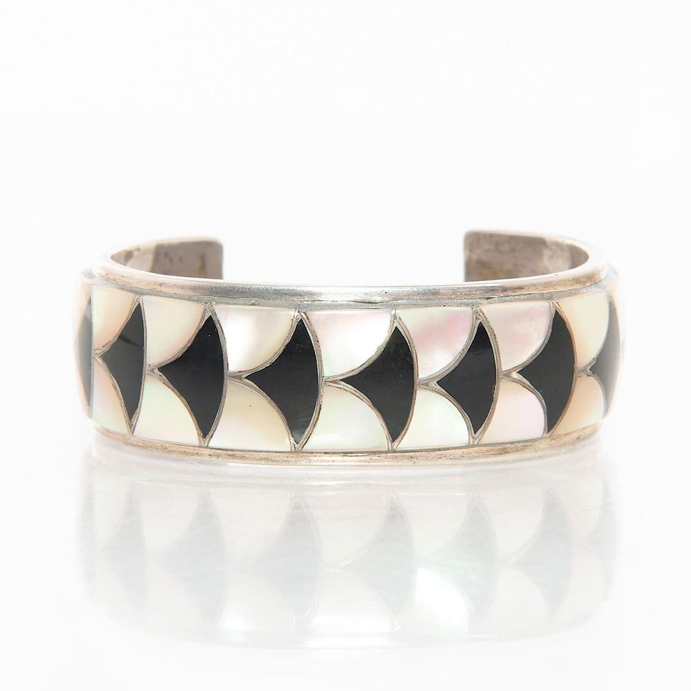 Appraisal: ORLINDA NATEWA ZUNI SILVER BRACELET Cuff bracelet with inlaid mother