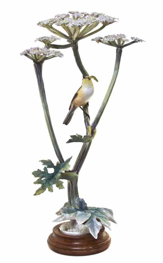 Appraisal: A Royal Worcester Dorothy Doughty Bird Chiff Chaff perched on