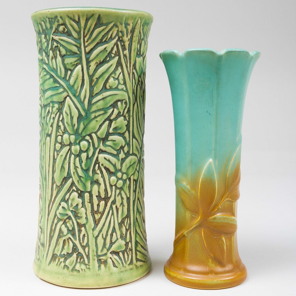 Appraisal: Two Weller Pottery Vases Molded with Leaves The larger black