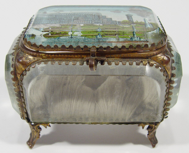 Appraisal: Brass and bevelled glass casket with hand coloured decoration to