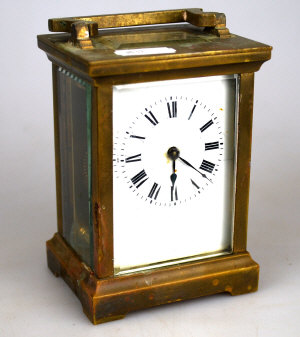 Appraisal: A brass carriage clock with enamel dial