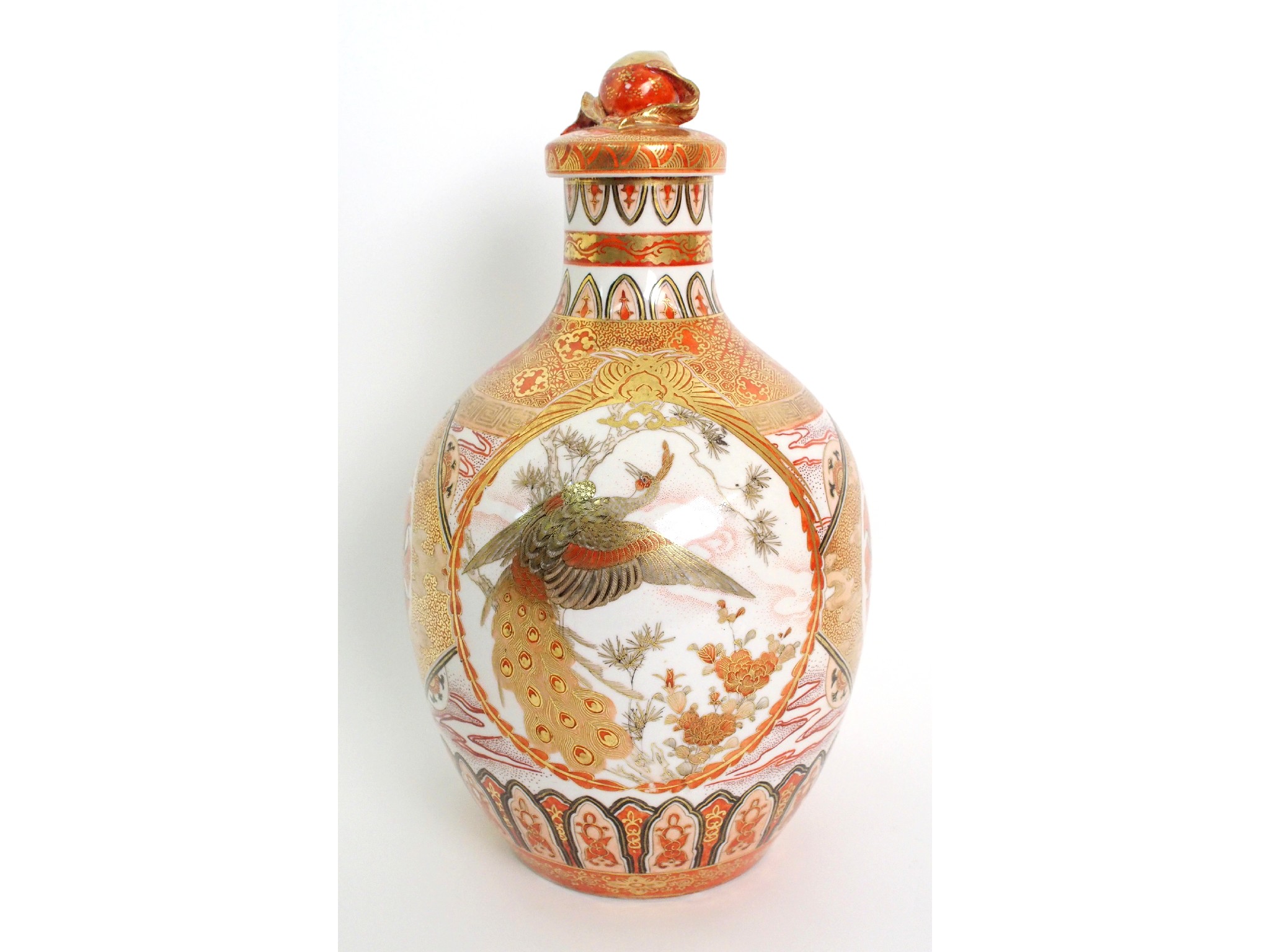 Appraisal: A Kutani bottle shaped vase and coverpainted with medallions of