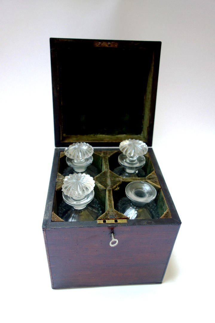 Appraisal: An early th century mahogany decanter box the square lift