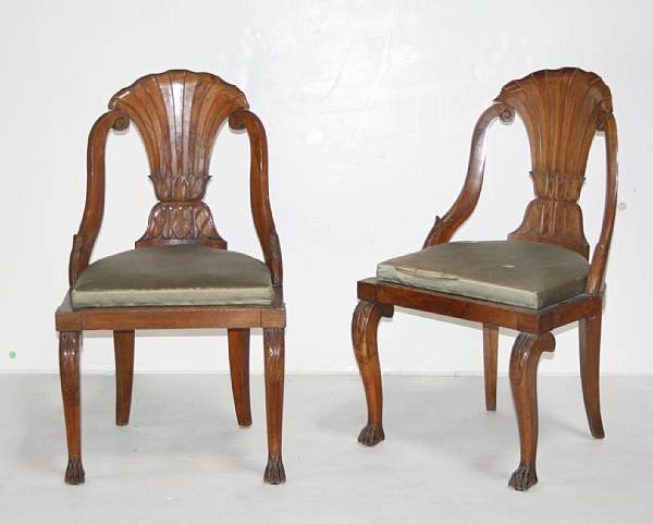 Appraisal: A pair of Continental Neoclassical walnut side chairs second quarter