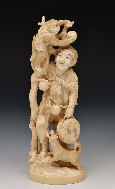 Appraisal: A Japanese ivory okimono of a Sarumawashi th Centurysigned Daisho