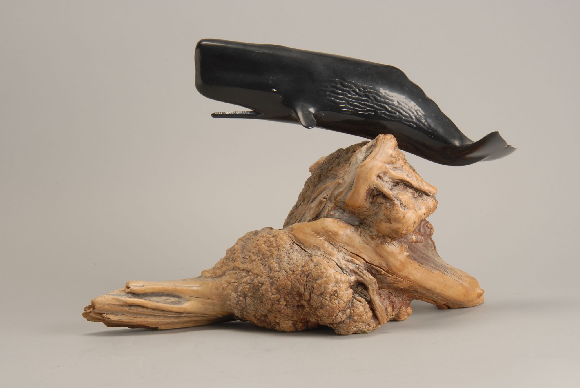 Appraisal: COMPOSITION FIGURE OF A SPERM WHALE mounted on a burl