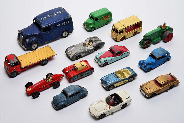 Appraisal: A COLLECTION OF PLAY WORN DINKY and other toy cars