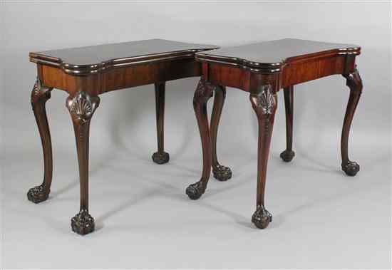 Appraisal: A pair of George II design mahogany card tables with