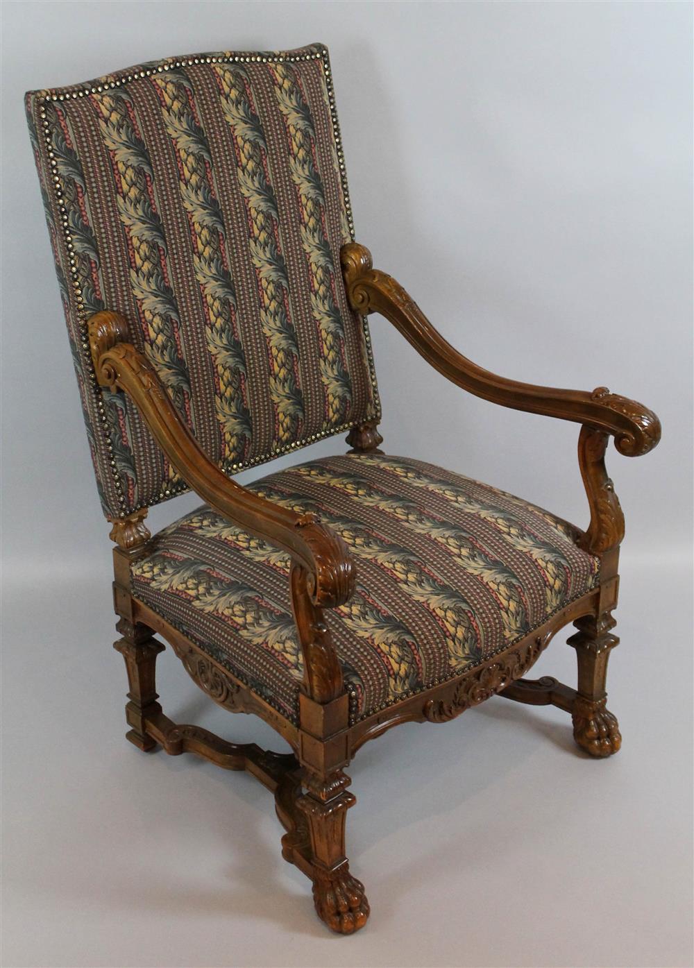 Appraisal: RENAISSANCE REVIVAL STYLE ARMCHAIR the shaped back and tight seat