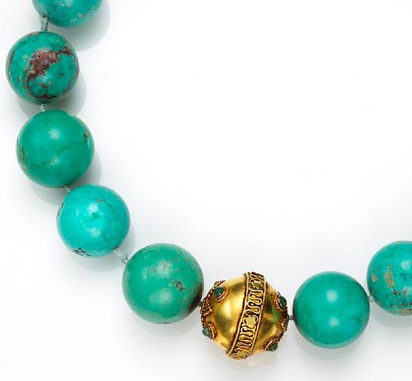 Appraisal: A turquoise bead emerald and eighteen karat gold necklace length