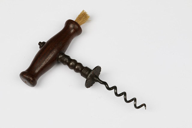 Appraisal: A STRAIGHT PULL CORKSCREW with a Henshall style button and