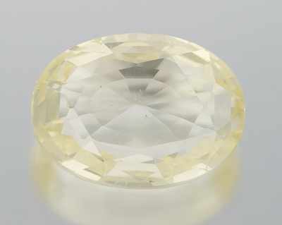 Appraisal: An Unmounted Fancy Color Yellow Sapphire Carat Oval faceted cut