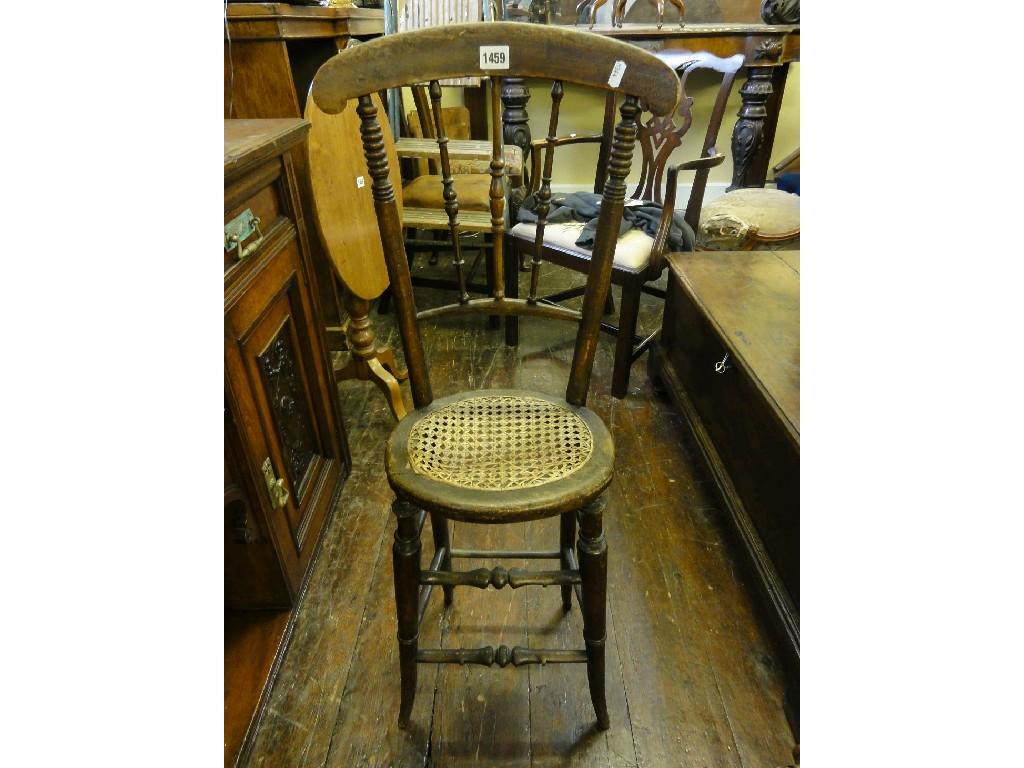 Appraisal: A th century child's correction chair with turned stained beech