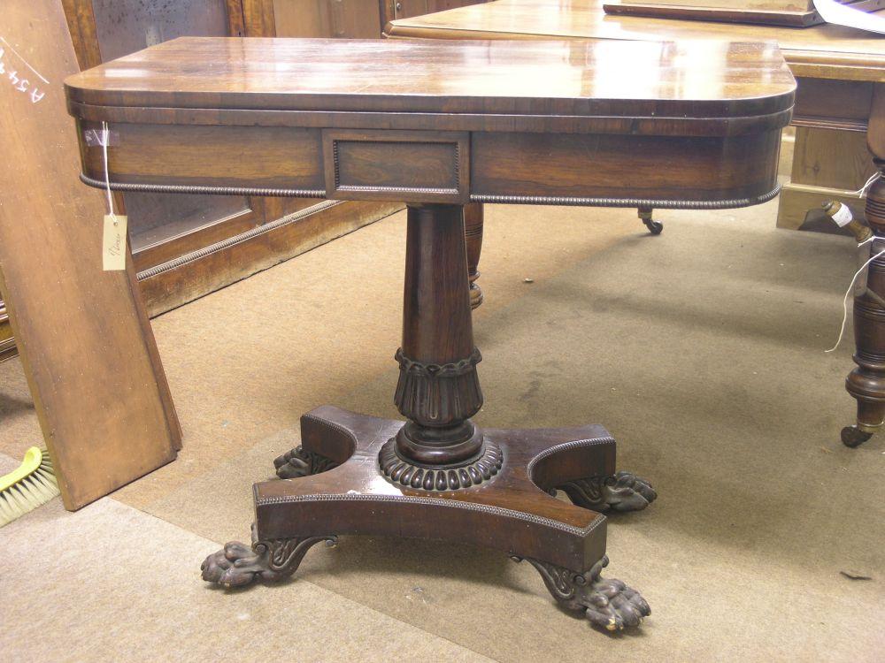 Appraisal: A William IV rosewood card table 'D' shape top enclosing