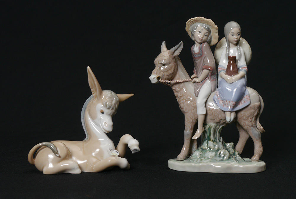 Appraisal: LLADRO PORCELAIN FIGURINES Donkey in Love Fulgencio Garcia sculptor issued