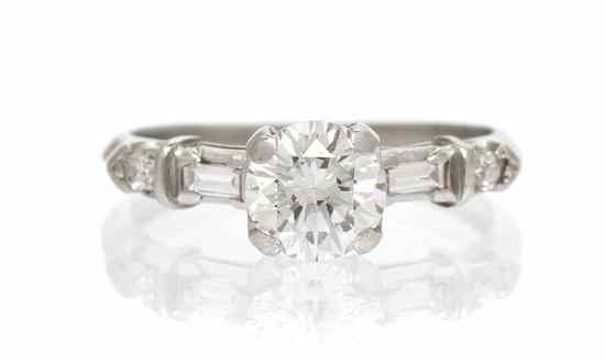 Appraisal: A Platinum and Diamond Solitaire Ring containing one round brilliant