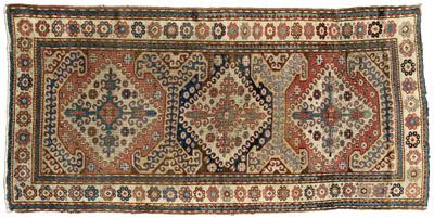 Appraisal: Kazak rug three central diamonds with bold hook borders sawtooth