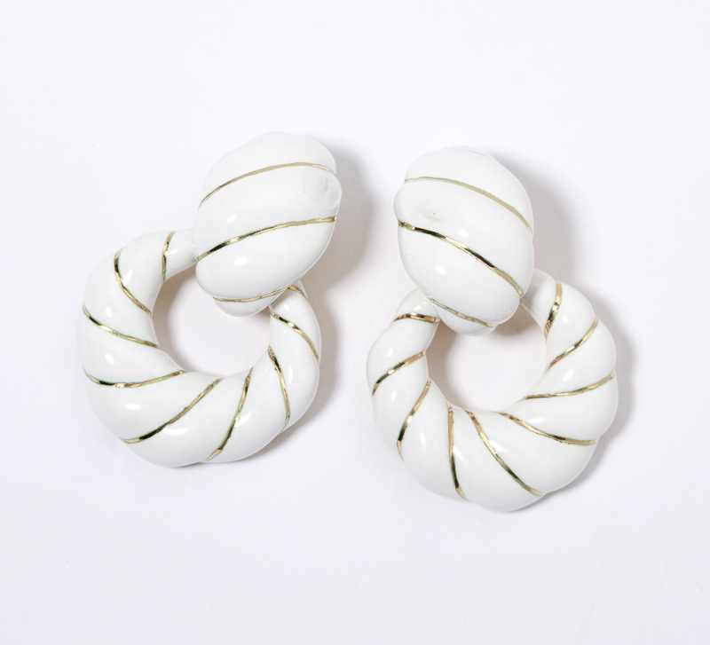 Appraisal: Designed entirely in white enamel with K gold and detachable