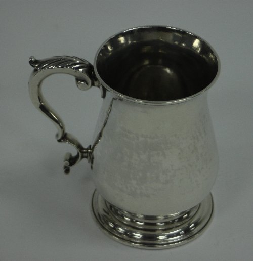 Appraisal: A George III silver mug London of baluster form with