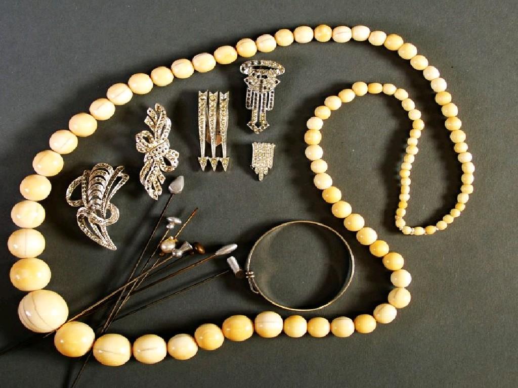 Appraisal: LONG SINGLE STRAND NECKLACE OF GRADUATED IVORY BEADS SEVEN HAT