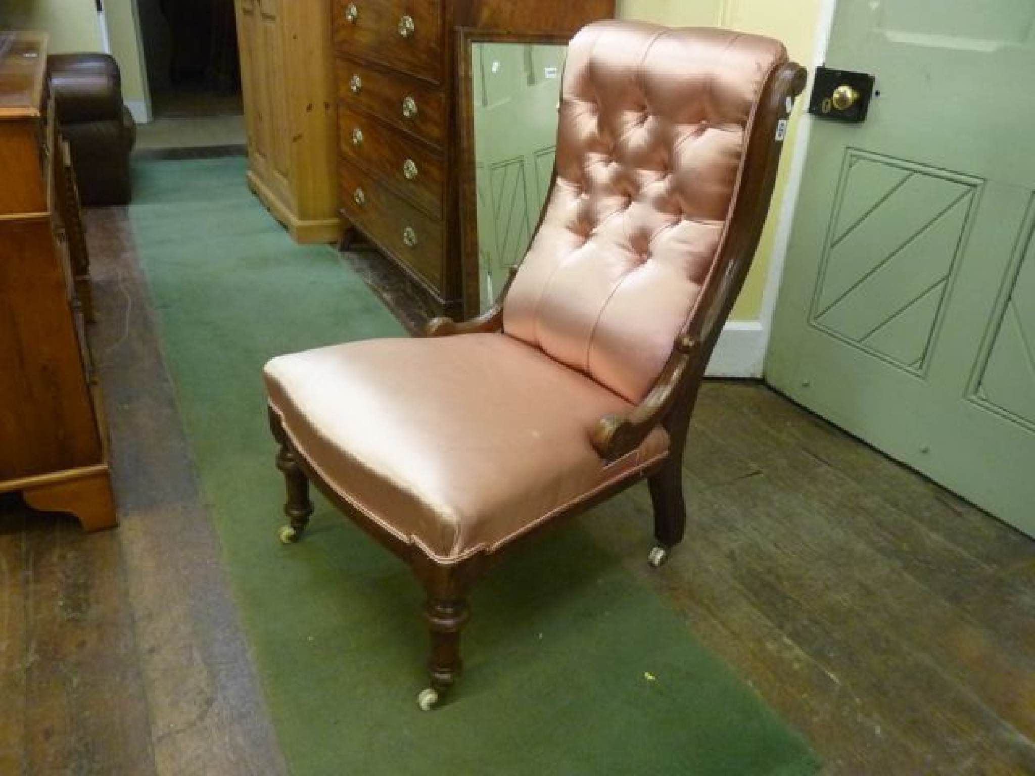 Appraisal: A Victorian mahogany drawing room chair with show wood frame