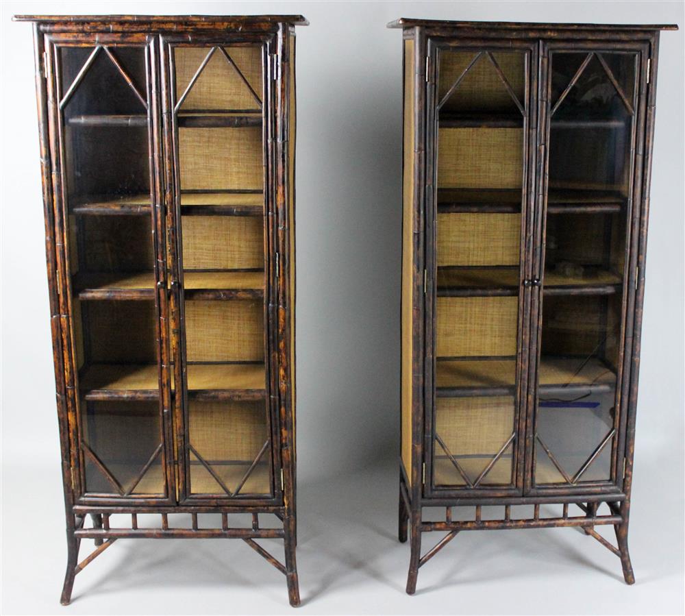 Appraisal: PAIR OF TORTOISE STAINED BAMBOO AND RATTAN LIBRARY CABINETS molded