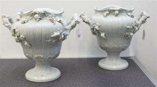 Appraisal: A Pair of Continental Blanc de Chine Porcelain Urns Height