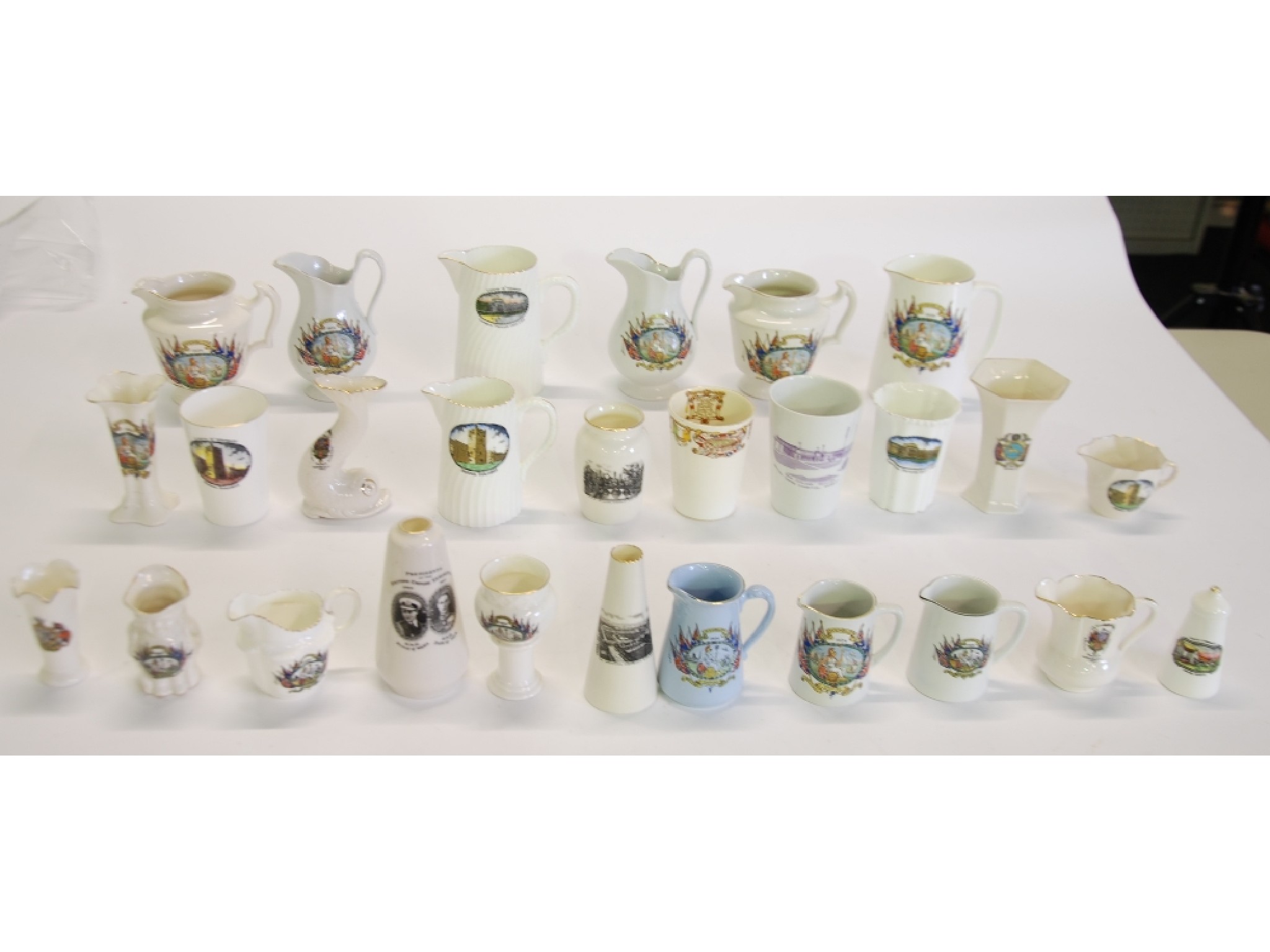 Appraisal: - BRITISH EMPIRE EXHIBITION SUNDRY CRESTED CHINA AND POTTERY JUGS