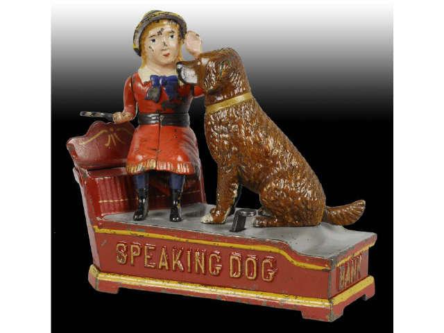 Appraisal: Cast Iron Speaking Dog Mechanical Bank Description Red dress variation