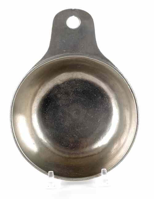 Appraisal: Pennsylvania pewter tab handle porringer early th c dia