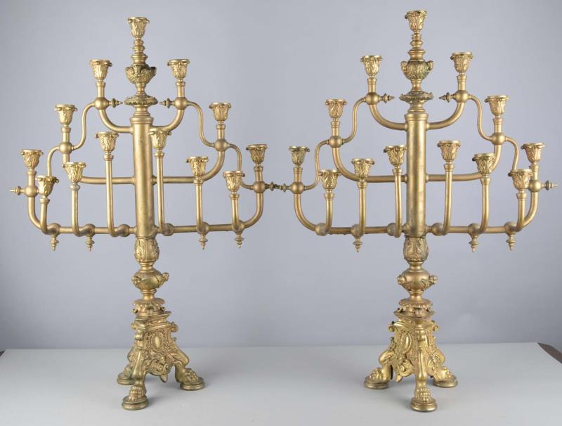 Appraisal: Lot Of Ornate Brass Candelabras Each candelabra holds a total