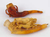 Appraisal: Two meerschaum pipes one a bull attacked by a dog