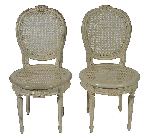 Appraisal: A PAIR OF LOUIS TH STYLE CARVED AND CREAM PAINTED