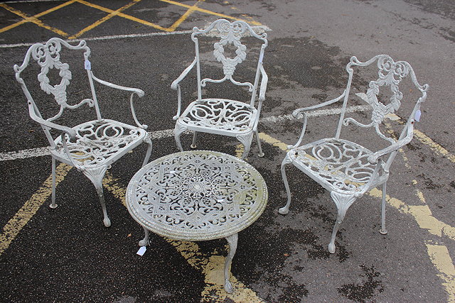 Appraisal: A SET OF THREE CAST ALUMINIUM GARDEN ARMCHAIRS together with