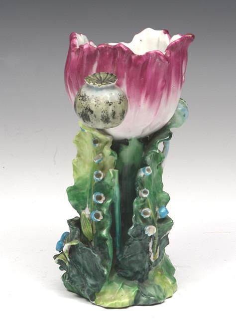 Appraisal: A CONTINENTAL PORCELAIN VASE in the form of a poppy