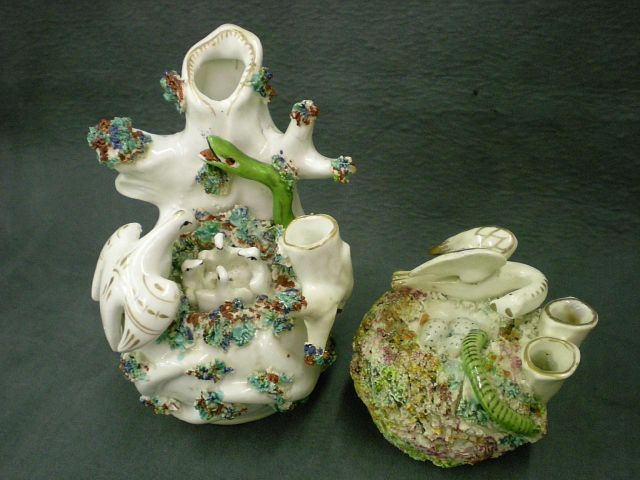 Appraisal: Two Staffordshire spills including spill depicting bird and nestlings she