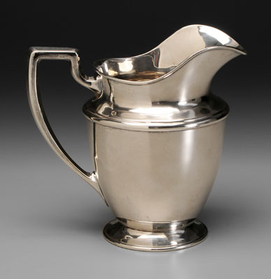 Appraisal: Sterling water pitcher helmet form with flared base squared handle