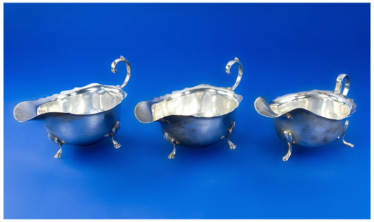 Appraisal: Matching Pair Of Silver Sauce Boats Of Scalloped Edge And