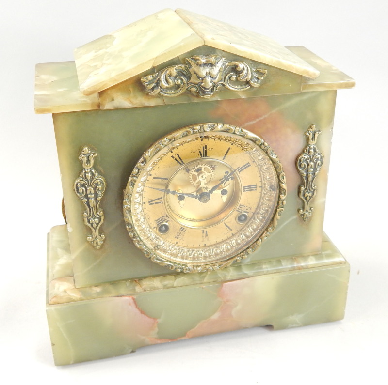 Appraisal: A French style onyx mantel clock with gilt metal mounts