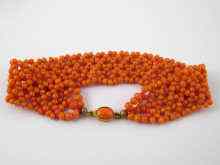 Appraisal: A beaded coral bracelet with yellow metal tests gold clasp