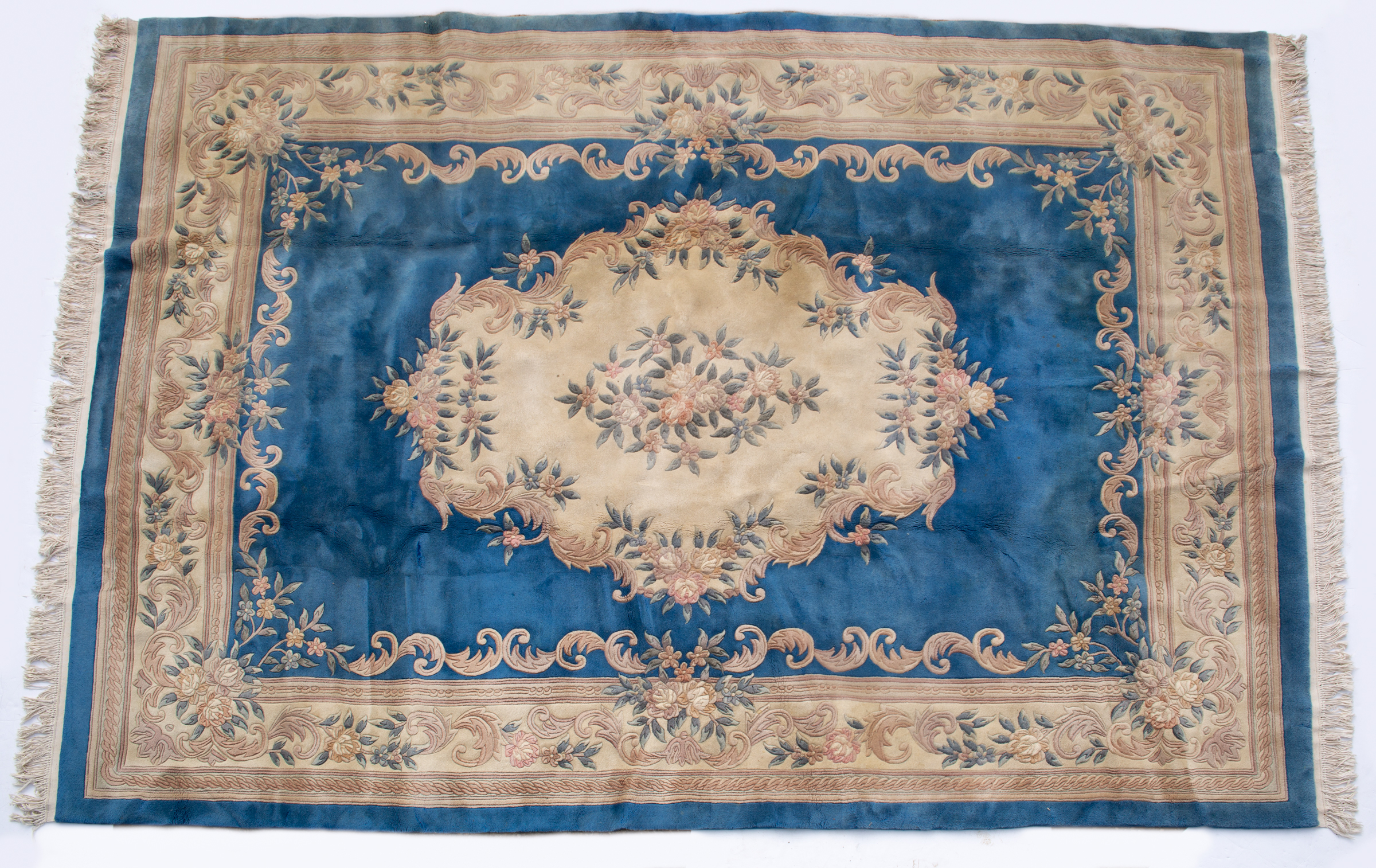 Appraisal: A Chinese blue ground carpet with stylized floral design and