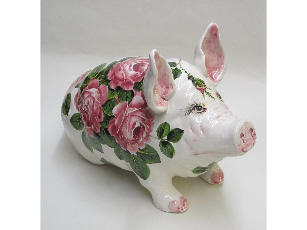 Appraisal: A Brian Adams 'Wemyss Style' pig painted with pink roses