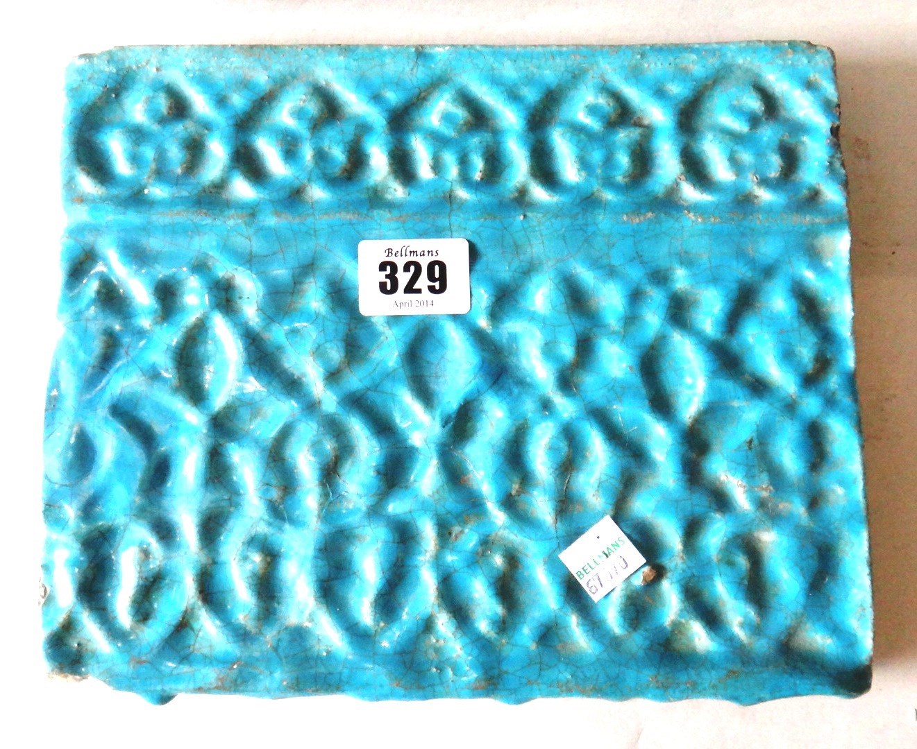 Appraisal: A turquoise glazed pottery rectangular tile Kashan Central Iran late