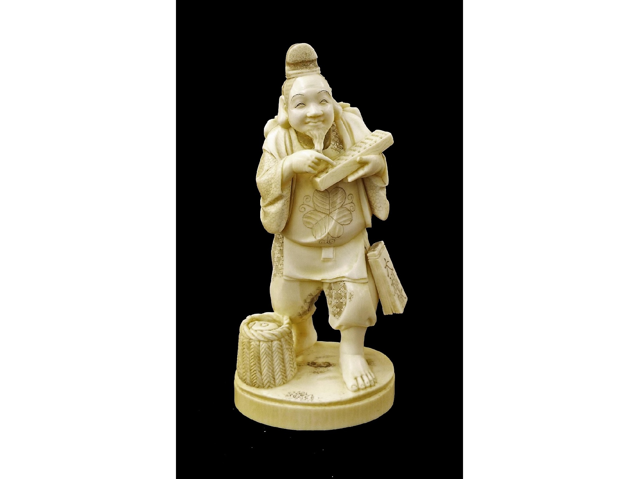 Appraisal: Japanese ivory okimono possibly signed Kazatomo carved and modelled as