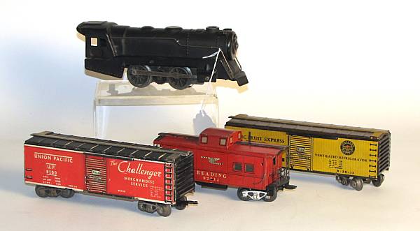 Appraisal: Marx seven-inch freight cars engine An assortment of lithographed freight